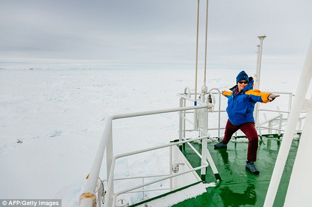 Australian Green Party Senator-elect Janet Rice up early doing some stretching on the top deck of the MV Akademik Shokalskiy