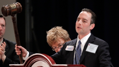 The new elected Republican National Committee (RNC) Reince Priebus holds up a gavel after winning the post during the Republican National Committee Winter Meeting, Friday, Jan. 14, 2011in Oxon Hill, Md. (AP)