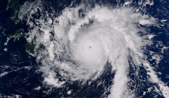 Typhoon Bopha is shown moving toward the Philippines in an Earth Observatory image from Monday, Dec. 3, 2012. (AP Photo/U.S. National Aeronautics and Space Administration, Jesse Allen)